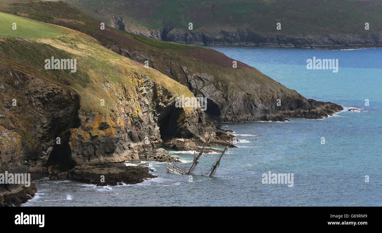 The Astrid tall ship which has ran aground off the south coast of Ireland on Wednesday, it is due to be surveyed today to determine whether it is possible to salvage. Picture date: Friday July 26, 2013. The vessel hit rocks off the Sovereign islands near Kinsale, Co Cork as it attempted to navigate the western entrance to the harbour near the tourist town. Photo credit should read: Niall Carson/PA Wire Stock Photo