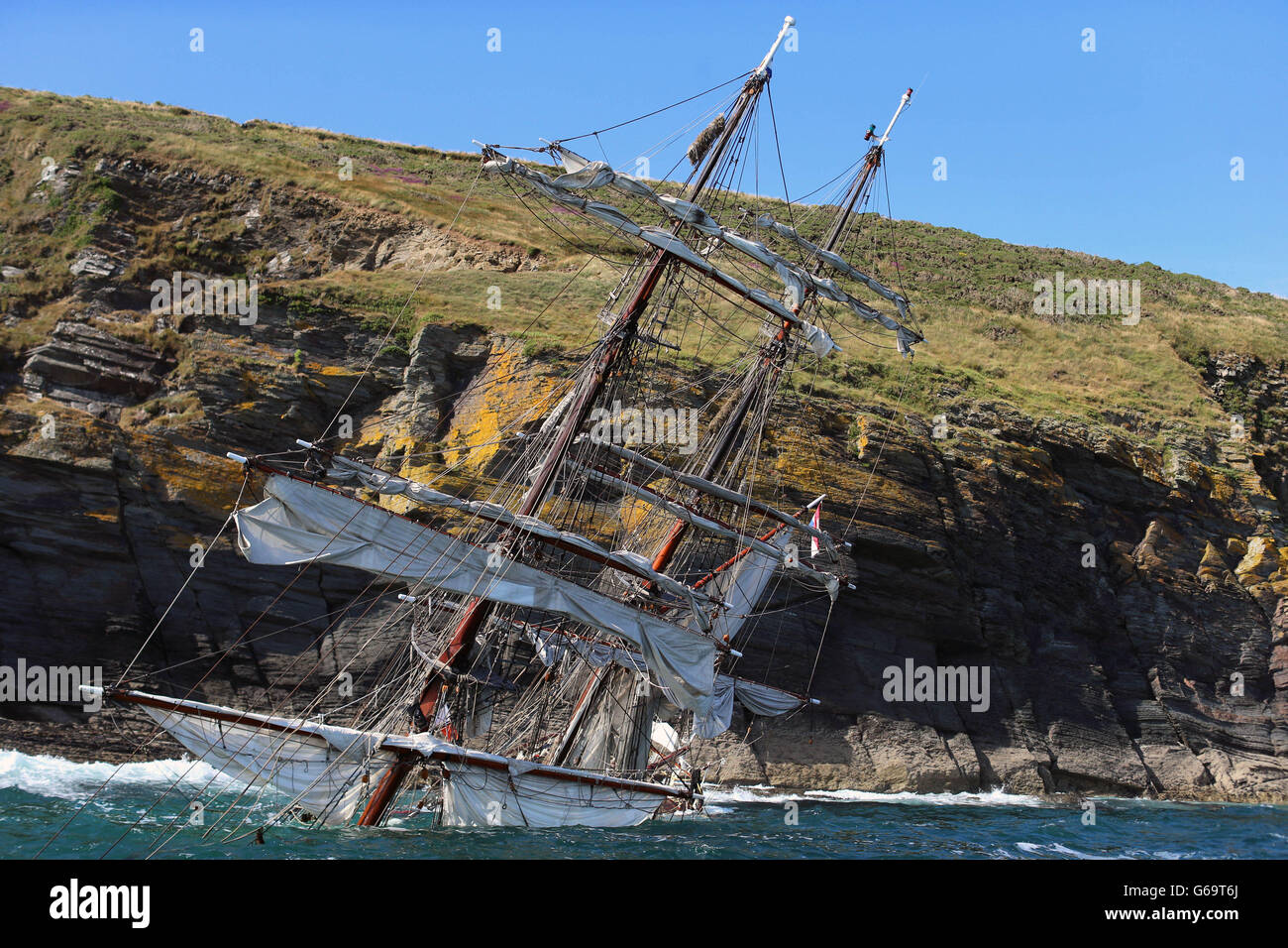 The Astrid tall ship which has ran aground off the south coast of Ireland on Wednesday, it is due to be surveyed to determine whether it is possible to salvage. Picture date: Friday July 26, 2013. The vessel hit rocks off the Sovereign islands near Kinsale, Co Cork as it attempted to navigate the western entrance to the harbour near the tourist town. Photo credit should read: Niall Carson/PA Wire Stock Photo