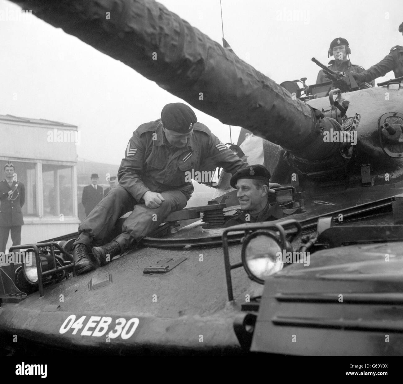 Prince Philip, The Duke of Edinburgh, in the driving seat of a 50-ton Chieftan tank during his visit to the Queen's Royal Irish Hussars at the Royal Armoured Corps Centre at Bovington Camp, Dorset. According to his instructor, Sgt Bill McLernon, 31, FROM Co Antrim, the Duke made a 'a very good show' at his first attempt at driving the tank. The Duke was visiting the regiment as Colonel-in-Chief Stock Photo