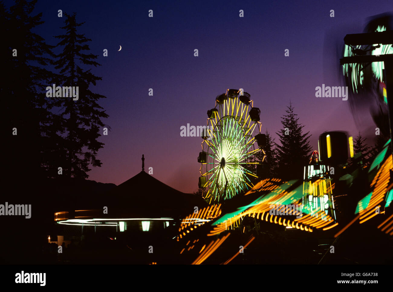 Carnival rides color 1980s hi-res stock photography and images - Alamy