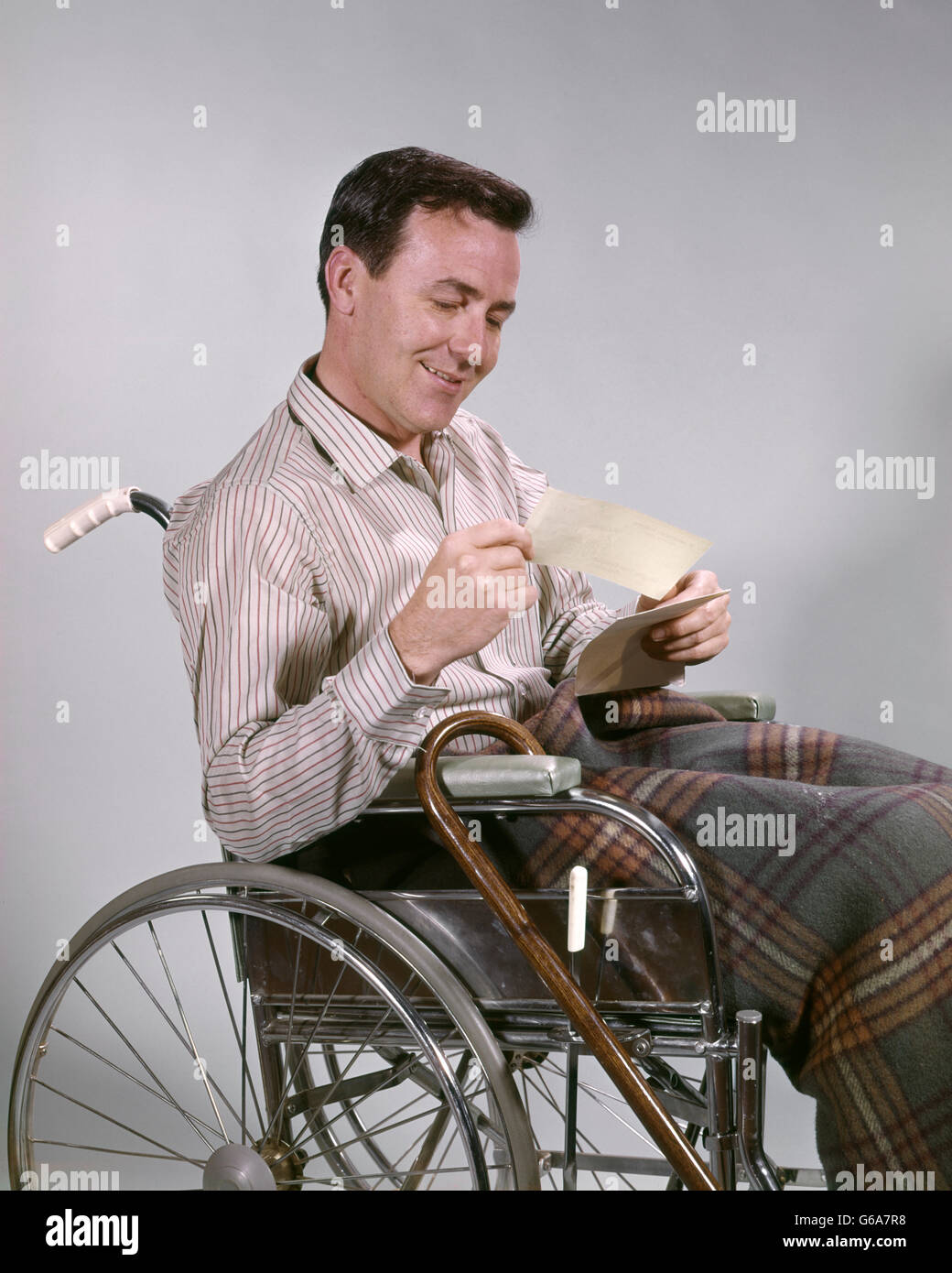 1960s man in wheelchair hi-res stock photography and images - Alamy