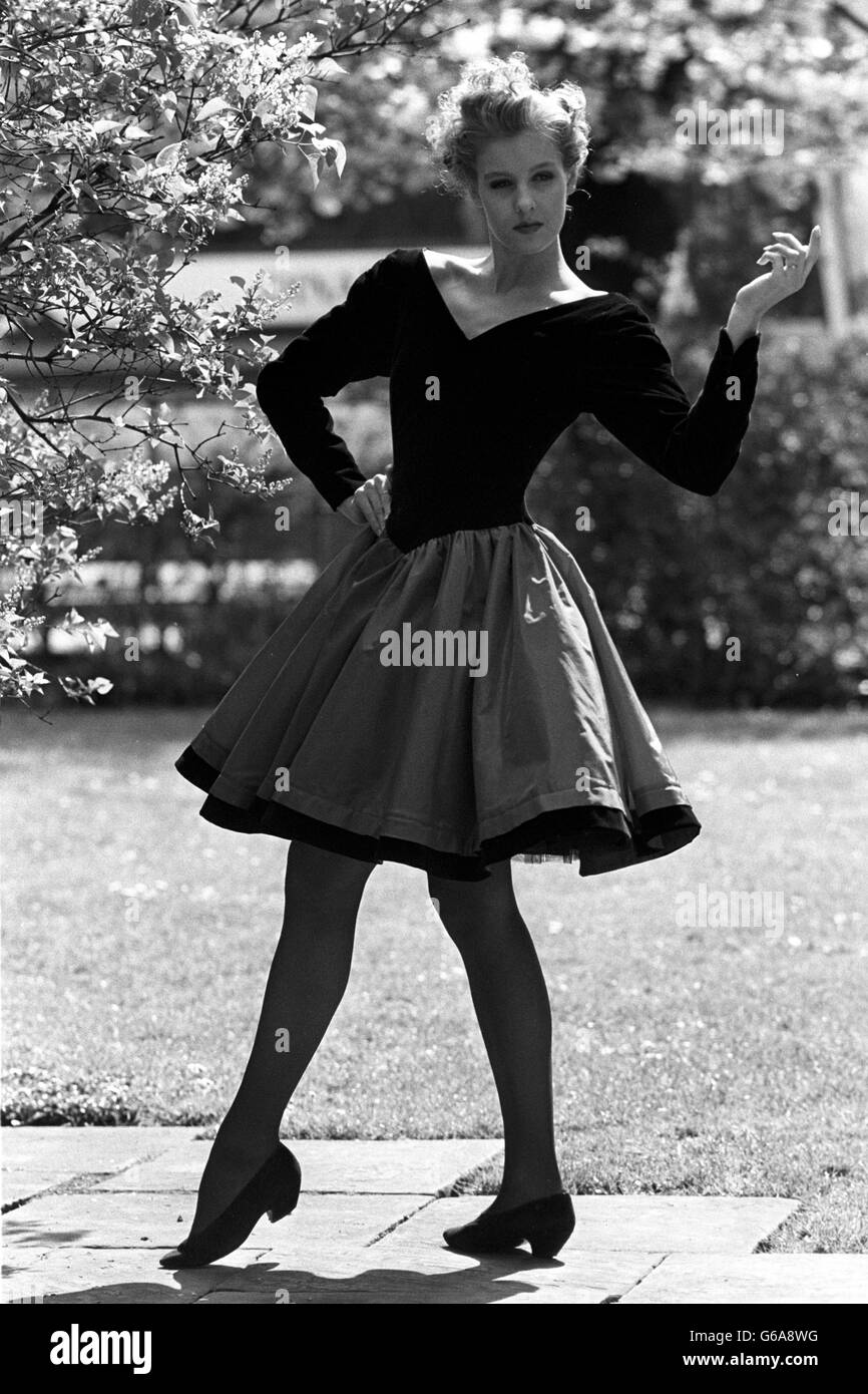 Model Ali Ward shows off Laura Ashley's new medieval look in the London sunshine at a preview of the fashion company's Autumn/Winter 1988 collection. Stock Photo