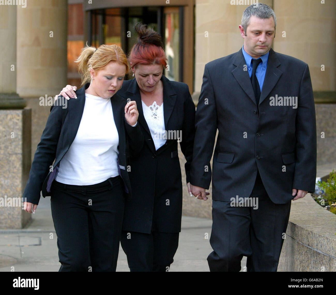 The family of a former Soldier Daniel Hutcheson leaving court after sentence was past on two men that killed her son. Lorraine O'Connor (Daniel's Mother) middle, Kevin Sweeney (Partner of Lorraine O'Connor) and Leigh Ann Hutcheson (Daniel's Sister). * Christopher Hutcheson, 23, strangled his cousin Daniel Hutcheson with a piece of rope in November 2001, as Andrew Ferguson, 19, looked on. Stock Photo