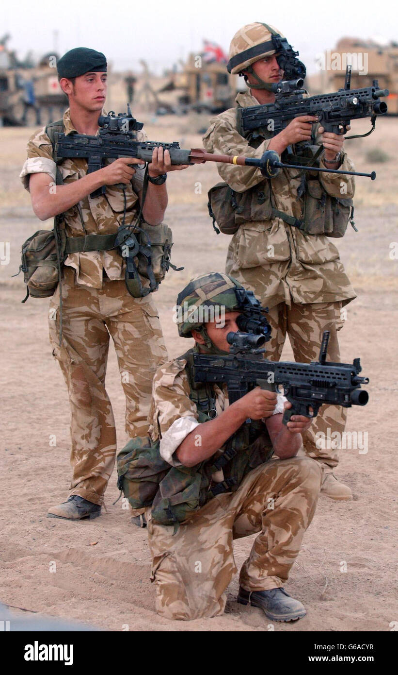 Soldiers weapons Basra Stock Photo