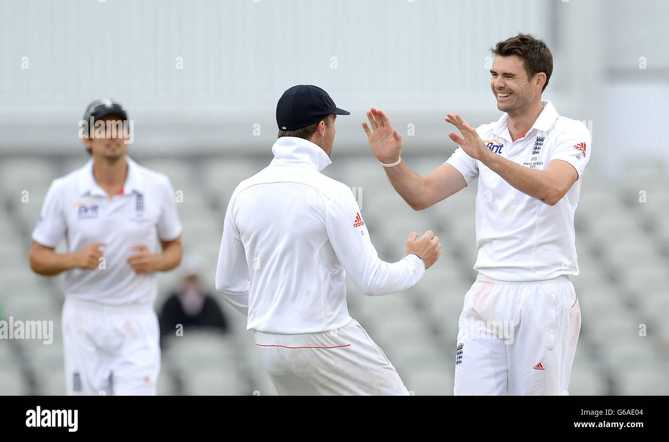 England's James Anderson celebrates taking the wicket of Australia's ...