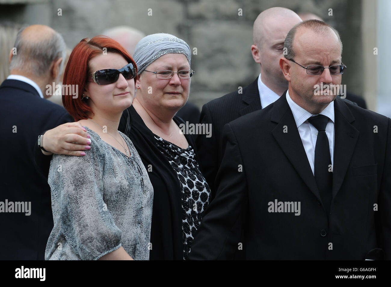 Kelvin and Margaret Roberts, the parents of Lance Corporal Craig Roberts after their sons funeral at Holy Trinity Church, Llandudno. Stock Photo