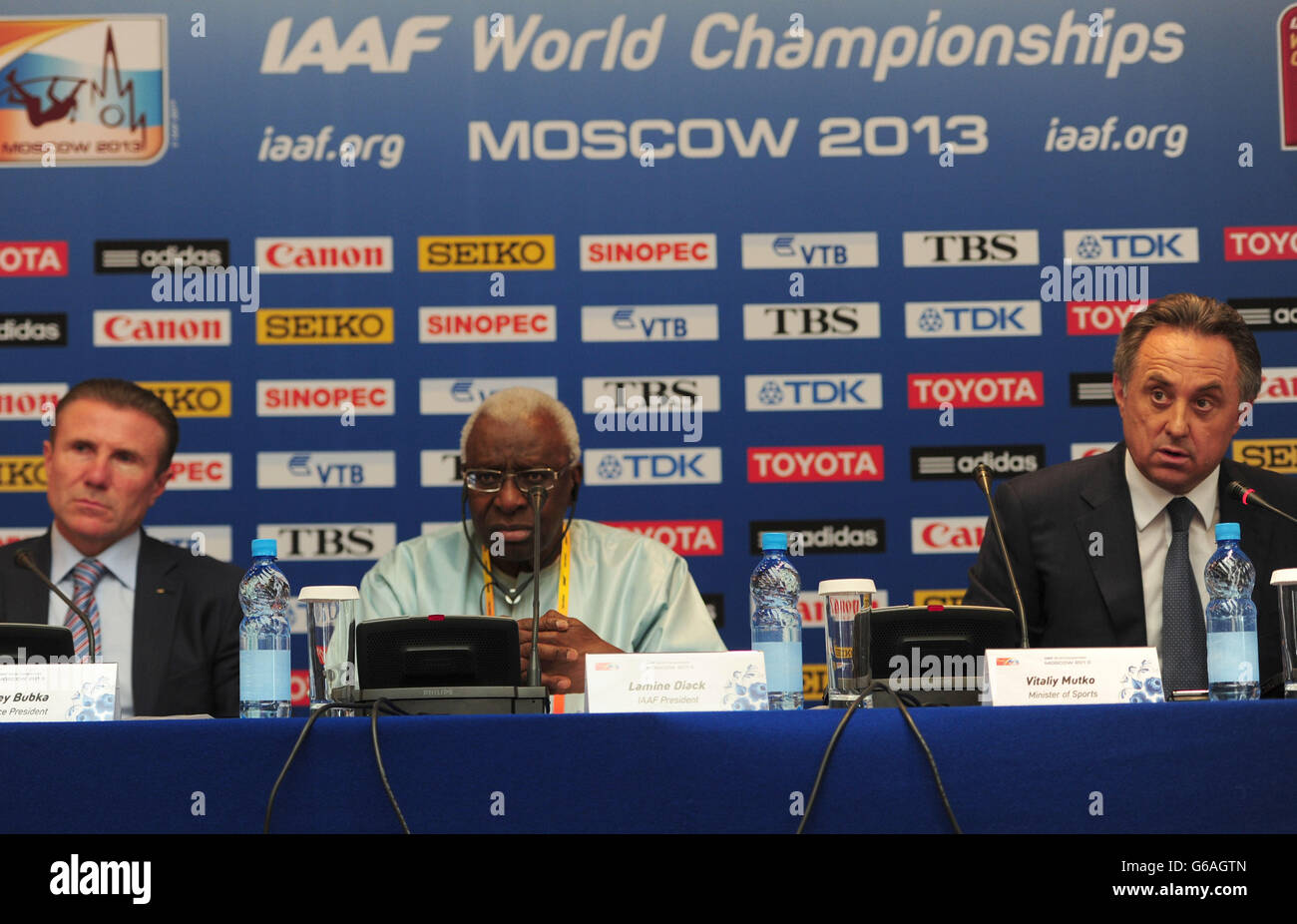 IAAF Vice-President Sergey Bubka (left), IAAF President Lamine Diack (centre) and Russian Minister for Sport Aleksey Vorobiev speak during a press conference at the Crowne Plaza Hotel, Moscow. Stock Photo