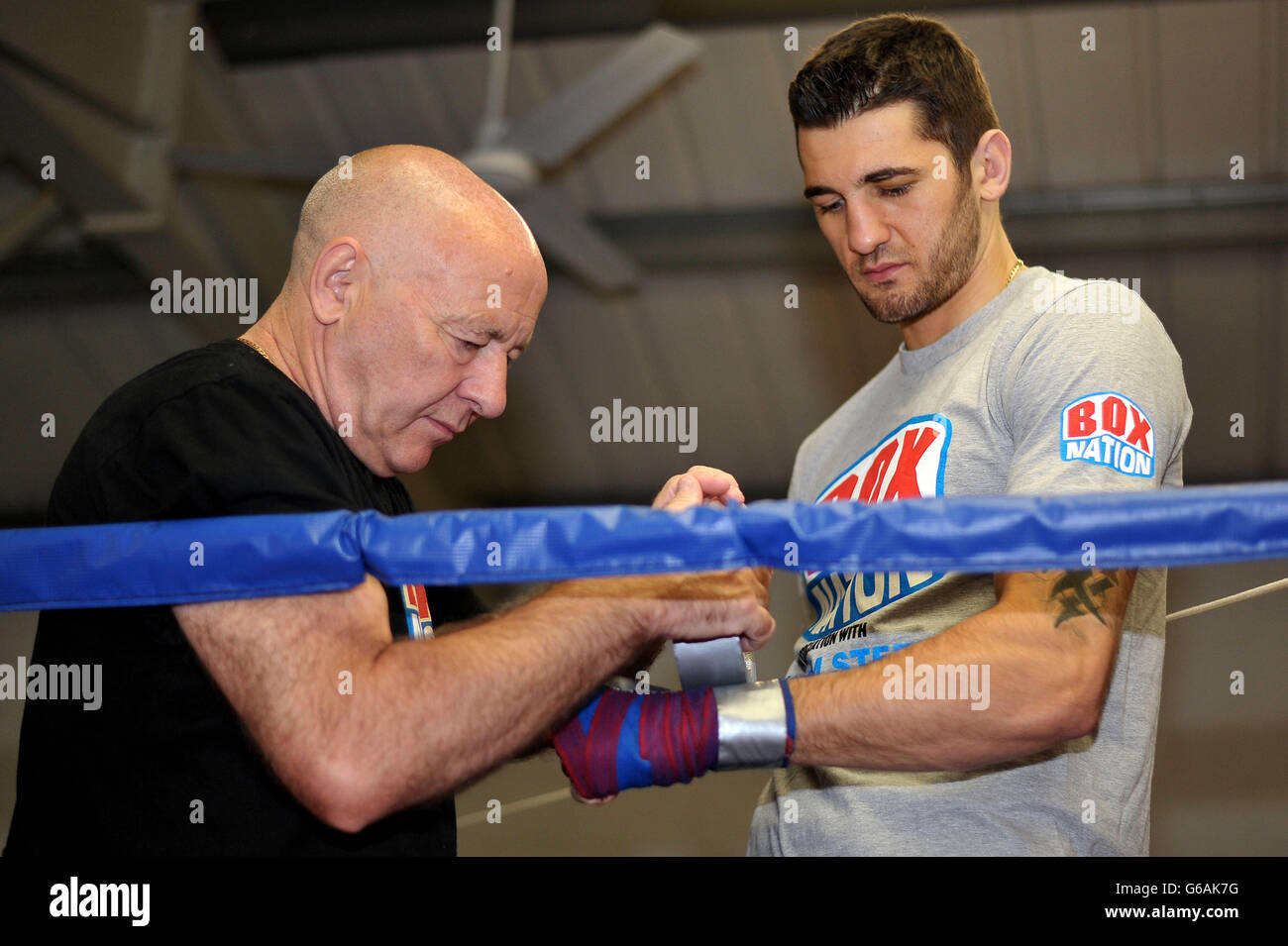WBO light heavyweight world champion Nathan Cleverly with his father and trainer Vince Cleverly during a media work out at Planet Fitness, Aberbargoed. Stock Photo