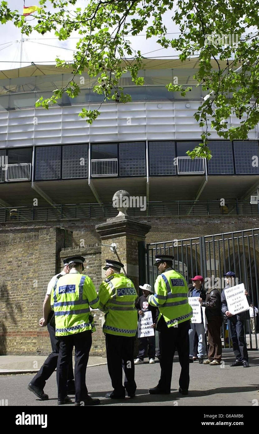 Human rights campaigner Peter Tatchell (far right) demonstrates outside Lords Cricket Ground as Zimbabwean cricket officials arrive at the ground. * England s cricketers should not be playing against the team which arrived for a tour in the country today, shadow foreign secretary Michael Ancram said today. Mr Ancram said that the tour, which includes two Test matches and a triangular one-day tournament, would effectively give a platform for Zimbabwe s president Robert Mugabe, who he accuses of human rights abuses. Stock Photo