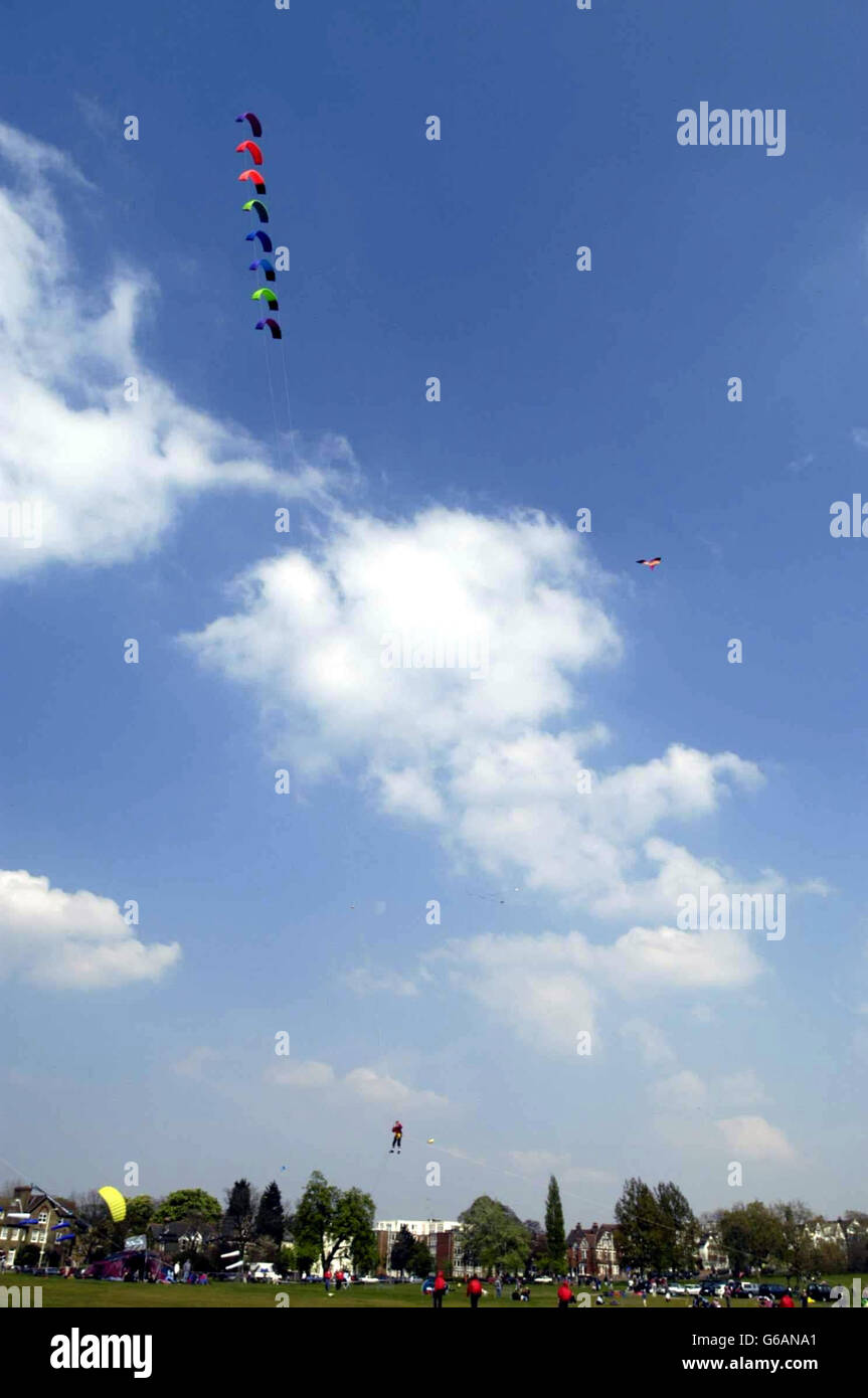 Martin Fossey soars 40 feet into the air using a 'Flexi Foil Super 10' kite during the sixth Streatham Common Kite Day on Streatham Common. Stock Photo