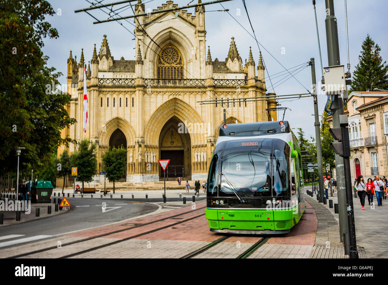Cathedral of Mary Immaculate, New Cathedral, and tram. Vitoria-Gasteiz, Álava, Basque Country, Spain, Europe Stock Photo