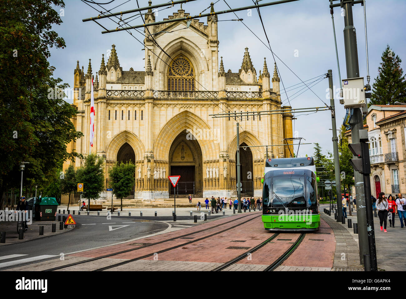 Cathedral of Mary Immaculate, New Cathedral, and tram. Vitoria-Gasteiz, Álava, Basque Country, Spain, Europe Stock Photo