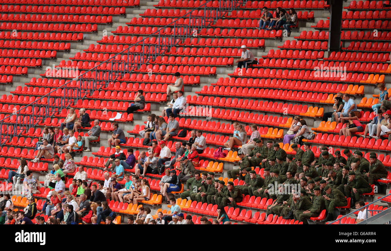 Russian soldiers sit amongst the spectators during day three of the 2013 IAAF World Athletics Championships at the Luzhniki Stadium in Moscow, Russia. Stock Photo