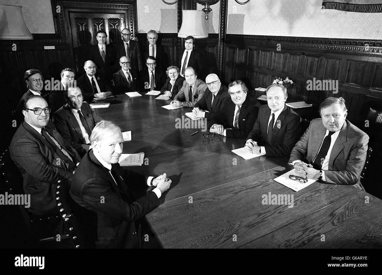 Opposition leader Neil Kinnock and his Shadow Cabinet for 1984/85, in London. Left to right, seated: Peter Shore, John Smith, Dr John Cunningham, Michael Meacher, Peter Archer, Michael Cooks, Lord Oram, Lord Ponsonby, Mrs Gwyneth Dunwoody, Stan Orme, Jack Dormand, Dennis Healey, Neil Kinnock and Roy Hattersley. Standing: Barry Jones, Donald Dewar, Giles Radice and John Prescott. Stock Photo