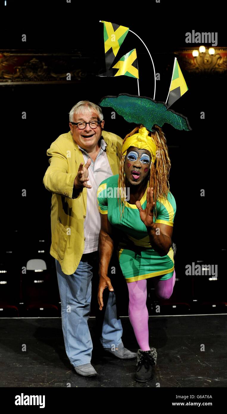Actor Christopher Biggins (left) with Hackney Empire's Puss in Boots pantomime dame KAT B, during a photocall at Hackney Empire in London, to launch the Dame Dash 2013 charity run. Stock Photo