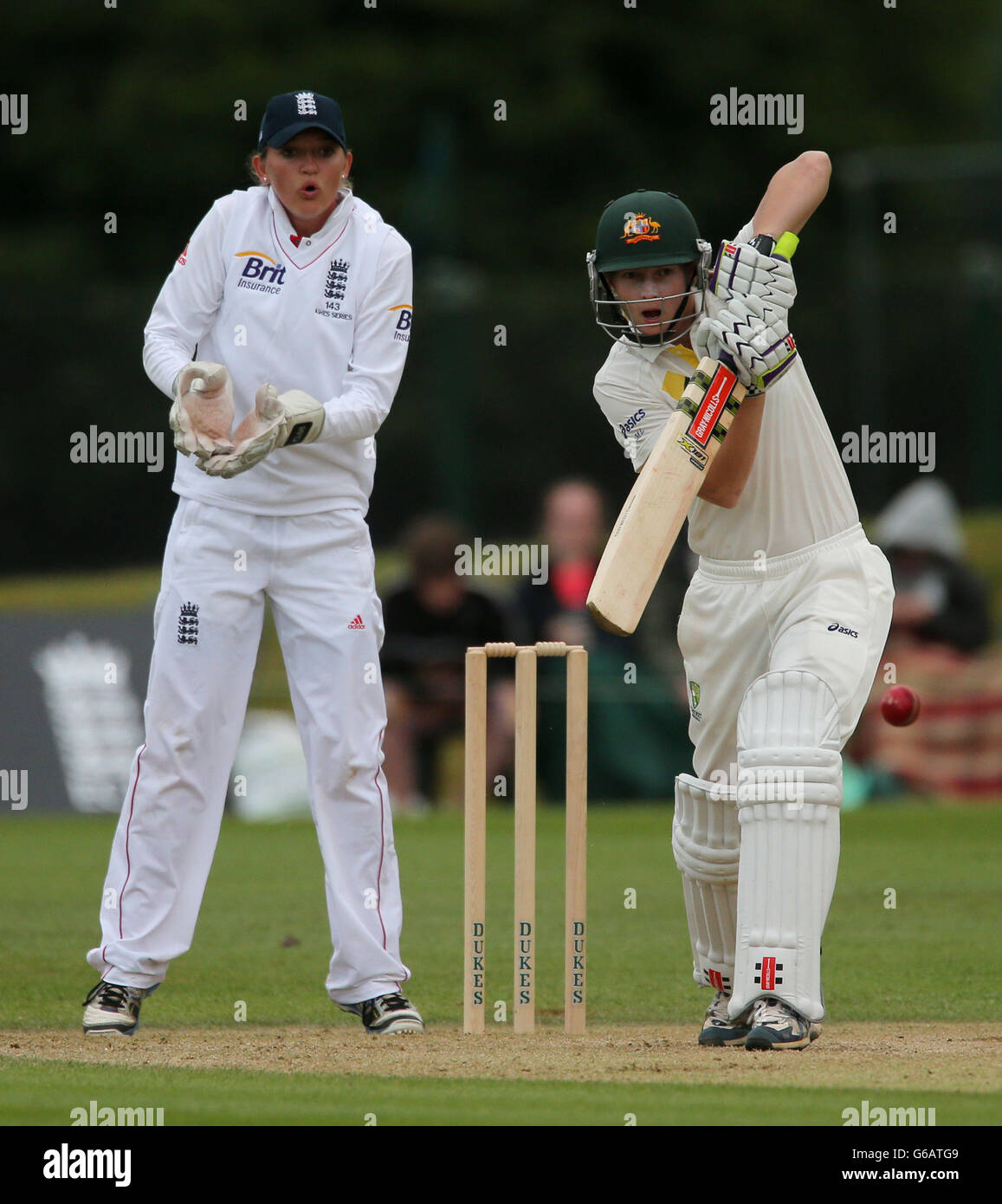 Australia's Meg Lanning defends watched by England wicketkeeper Sarah Taylor during third day of First Womens Ashes test match at Wormsley Cricket Ground, High Wycombe. Stock Photo