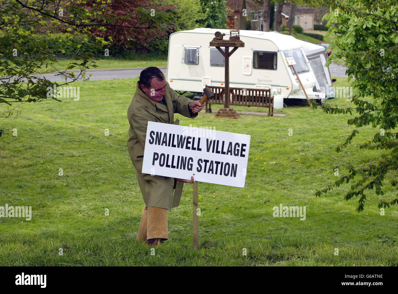 East Cambs Election officer, Sean Gallagher, preparing for tommorrow's local elections on the village green in Snailwell, Cambridgeshire. Stock Photo