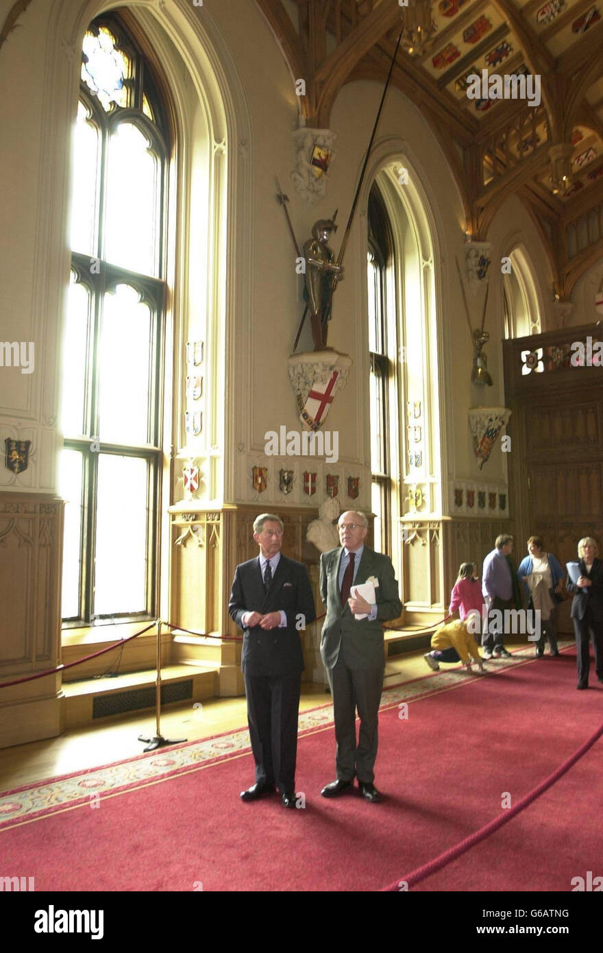 The prince of Wales in Windsor Castle's St George's Hall with Sir Hugh Roberts, director of the Royal Collection, during a tour of the castle's public areas. In a bid to boost tourism, the heir to the throne took the tour of his mother's Castle with travel executives. Stock Photo