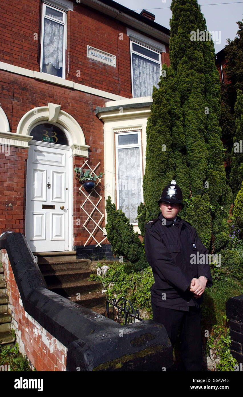 Police guard a house in Breedon Hill Rd, Derby,that is the former home of Omar Khan Sharif who