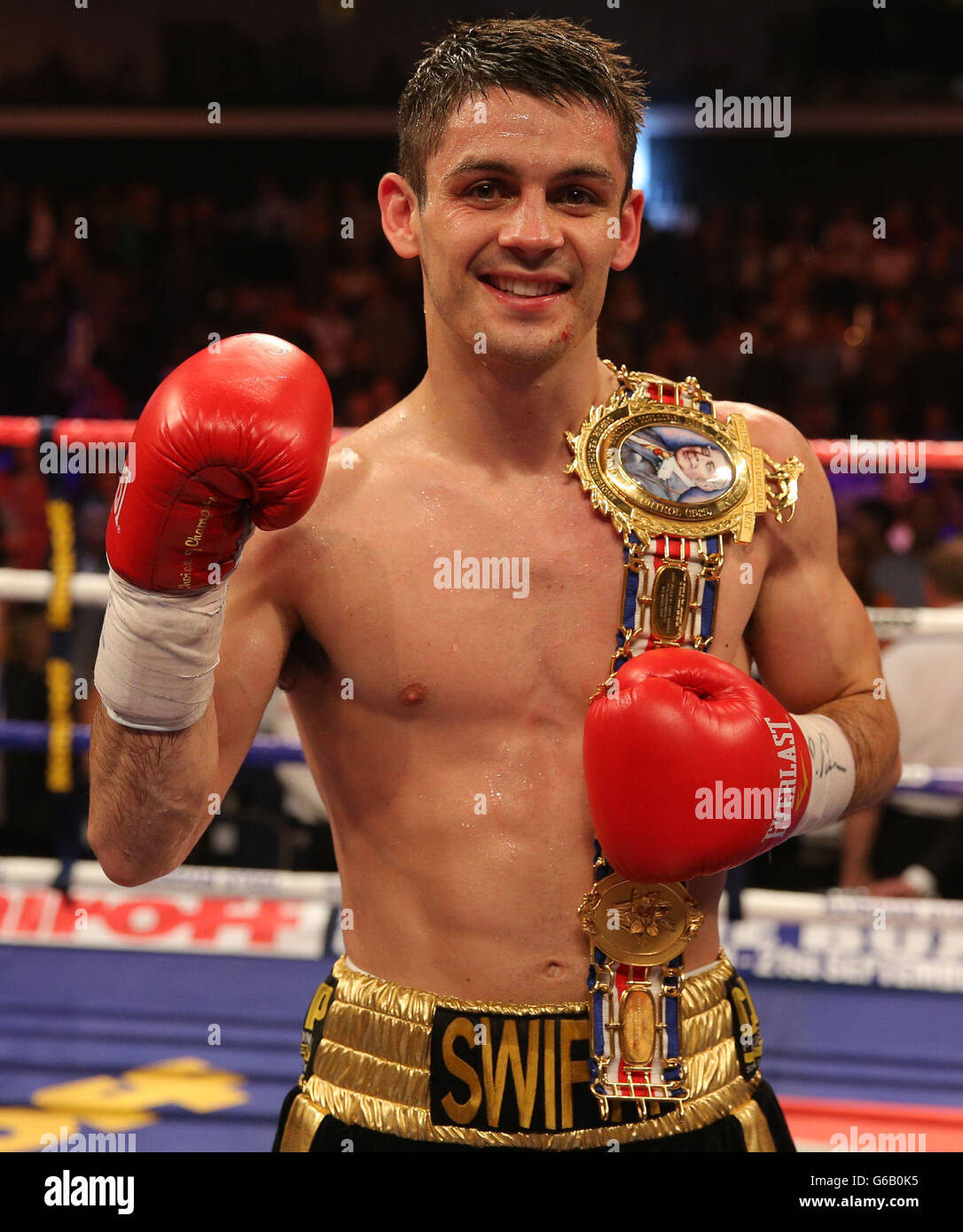 Stephen Smith celebrates beating Gary Buckland during their British Super-Featherweight Championship at the Motorpoint Arena, Cardiff. Stock Photo