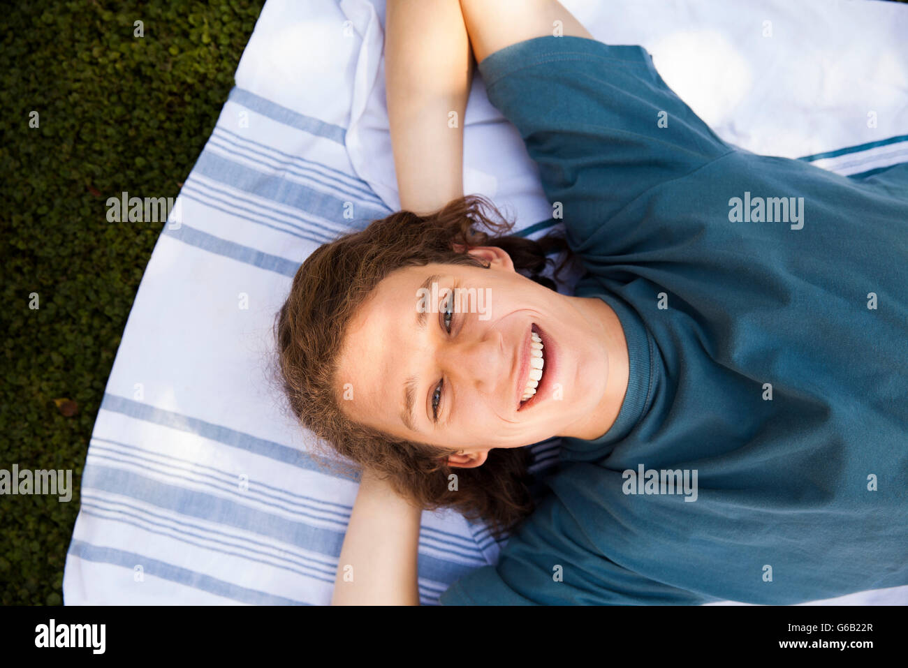 Young man relaxing in the park Stock Photo