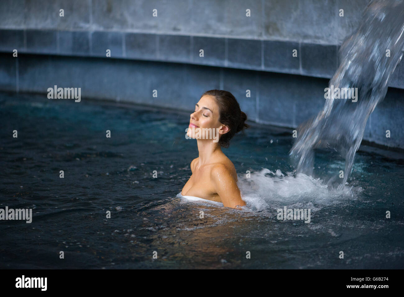 Woman relaxing in spa Stock Photo