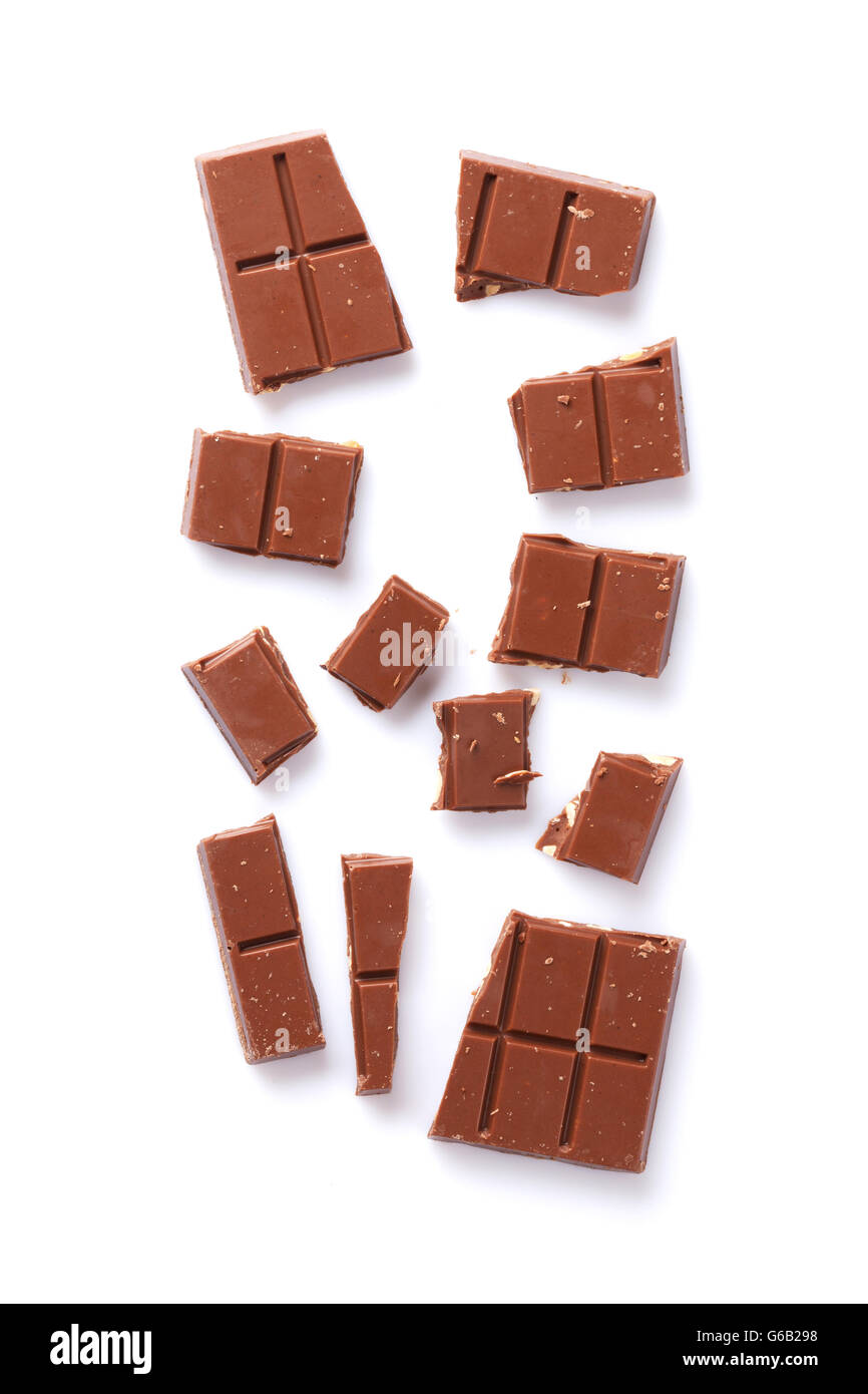 Broken chocolate bar. Isolated on white background. Top view Stock