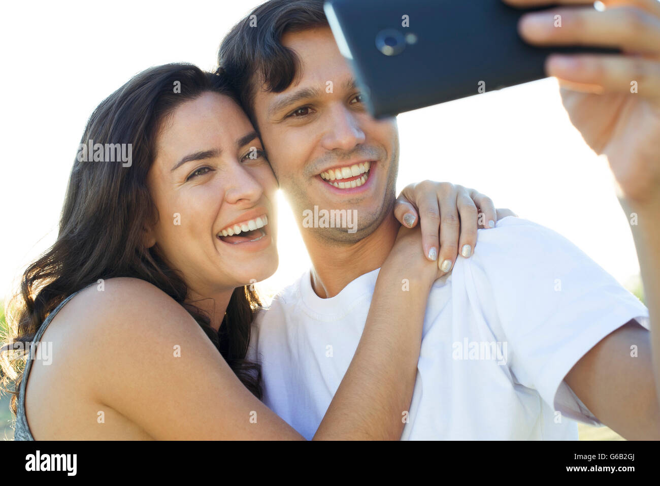 Couple posing for selfie Stock Photo