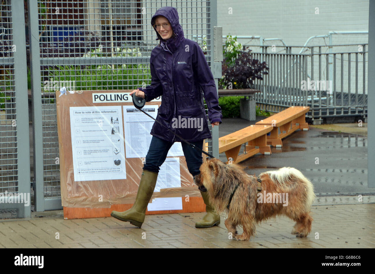 Wandsworth Common, London, UK, 23 June 2016,  Laura with dog Ghengis leave the polling station. People vote at the Wandsworth Common polling station in the EU referendum. Credit:  JOHNNY ARMSTEAD/Alamy Live News Stock Photo