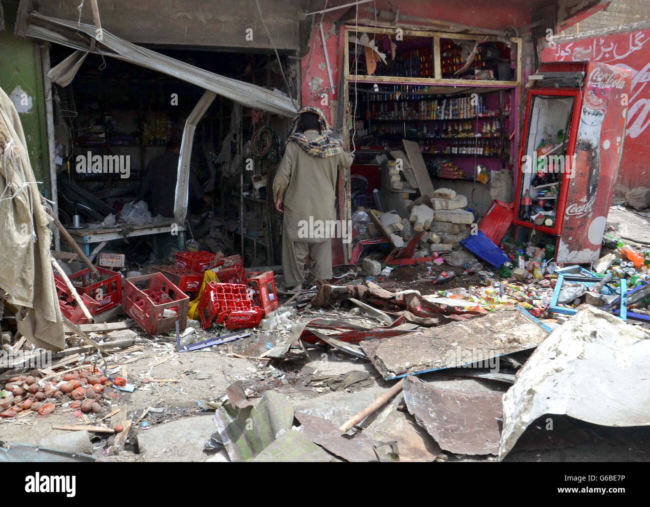Views after bomb blast at Almo Chowk of Quetta on Friday, June 24, 2016. According to sources the remote-controlled blast occurred near a shop at Almo Chowk on Airport Road, spreading panic in the area. Security officials confirmed the deaths in the incident, saying the explosives weighing eight to 10 kilogram were installed on a motorcycle parked outside a nearby shop. Stock Photo