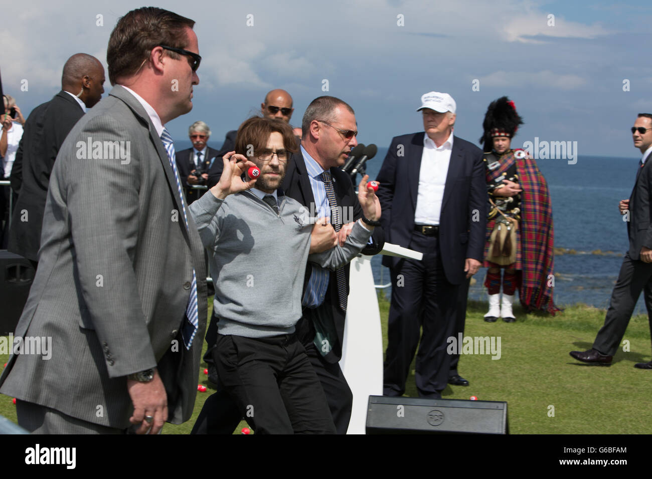 Republic presidential nominee Donald Trump holds a press conference on the 9th hole tee, with his family members Don, Eric and Ivanka, at his Trump Turnberry Golf Course, in Turnberry, Scotland, on 24 June 2016. Stock Photo