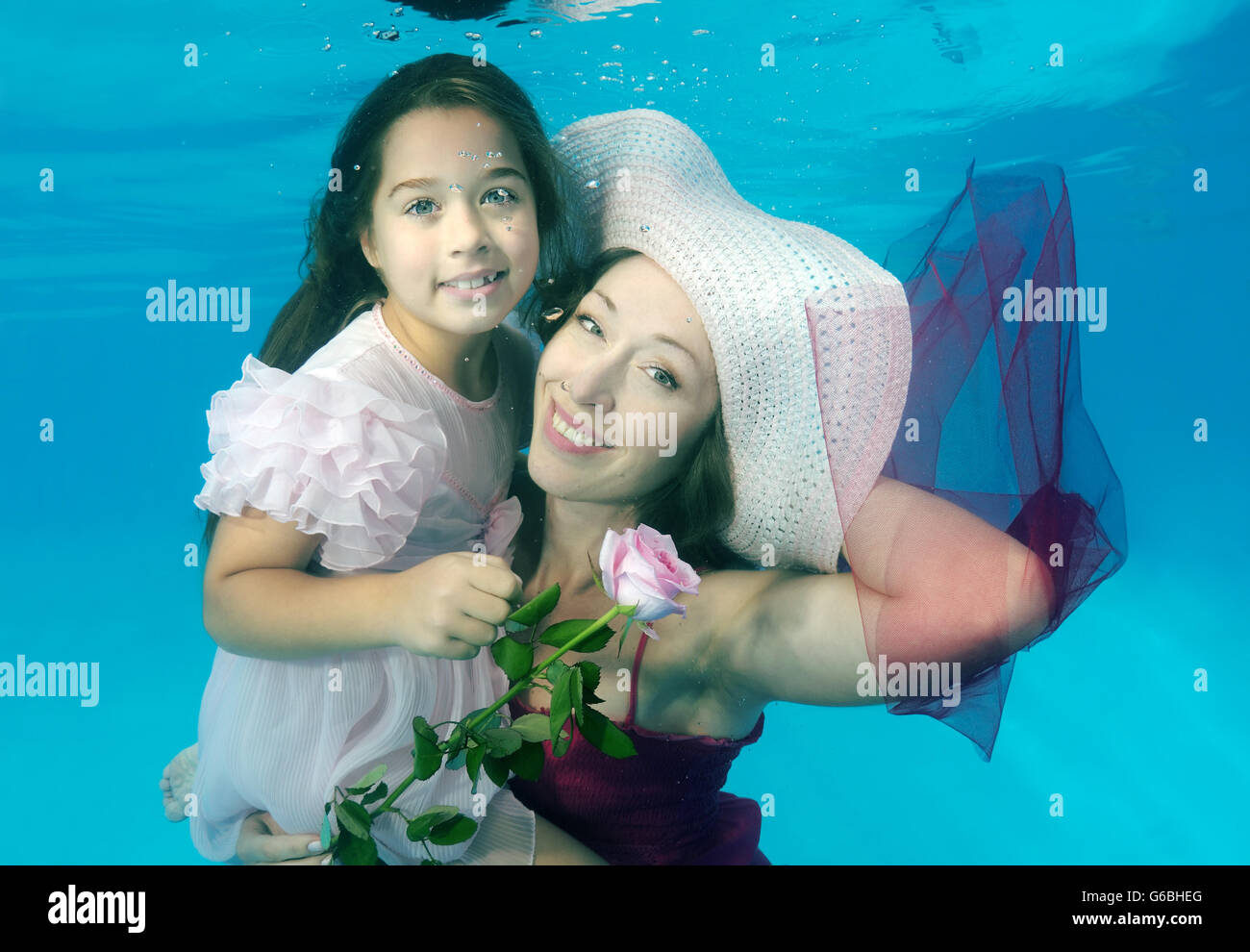 Odessa, Ukraine. 3rd Mar, 2016. Woman and girl presenting underwater fashion in pool © Andrey Nekrasov/ZUMA Wire/ZUMAPRESS.com/Alamy Live News Stock Photo