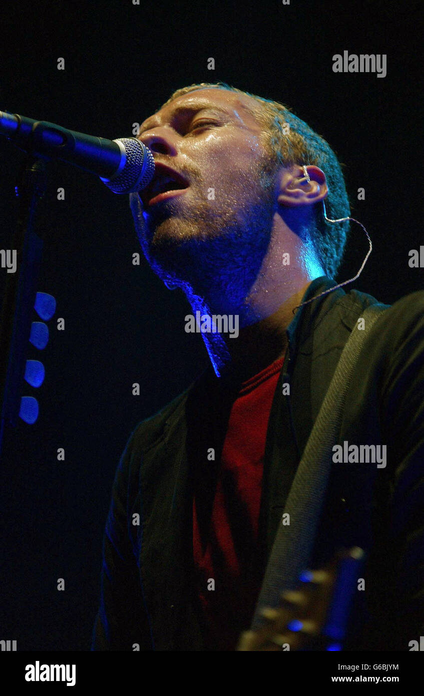 Chris Martin, lead singer of rock band Coldplay performing live at Earls Court. Stock Photo