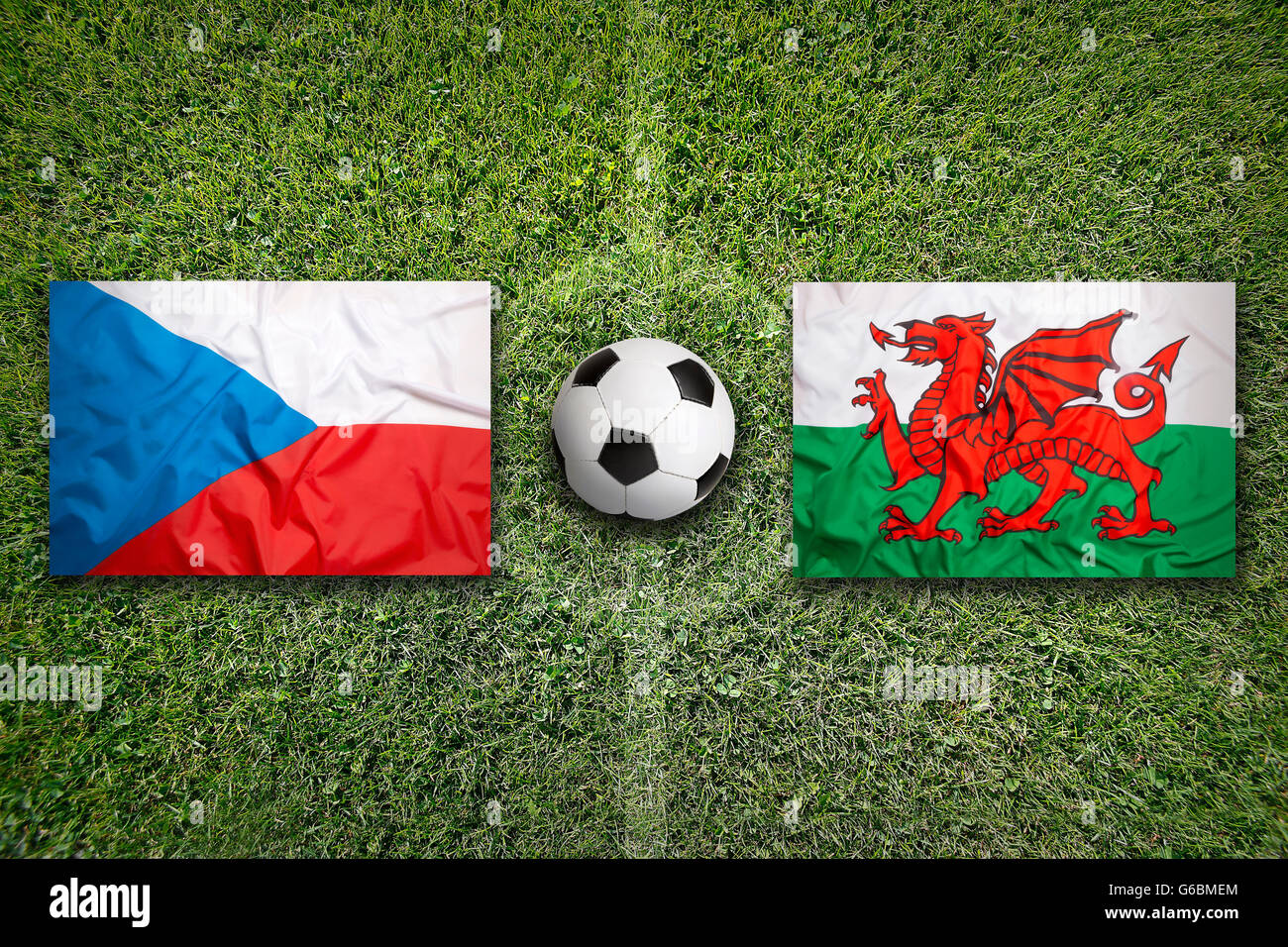Czech Republic vs. Wales flags on green soccer field Stock Photo