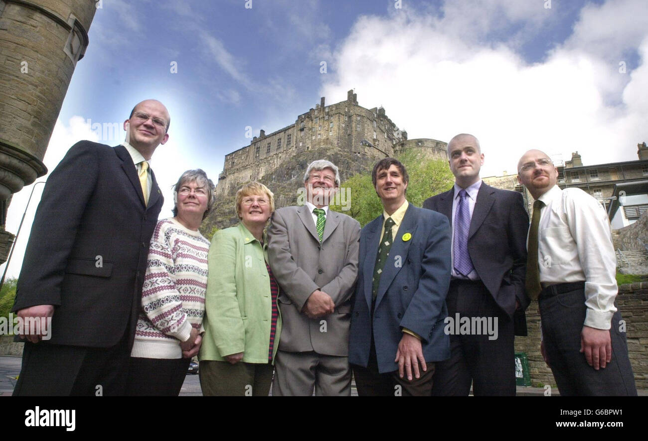 Scottish Green Party members (l-r) Mark Ballard, Shiona Baird, Eleanor Scott, leader Robin Harper, Chris Ballance, Mark Ruskell and Patrick Harvie at their first Photocall since the Scottish Parliamentary elections, *..with all seven of their new MSPs getting together near Edinburgh Castle, Edinburgh. Party leader Robin Harper today said his party might rule out any deal in the short term with a future coalition Executive. The comment came ahead of a meeting between Mr Harper and the party s six new MSPs who were all returned to Holyrood in last week s election. Stock Photo