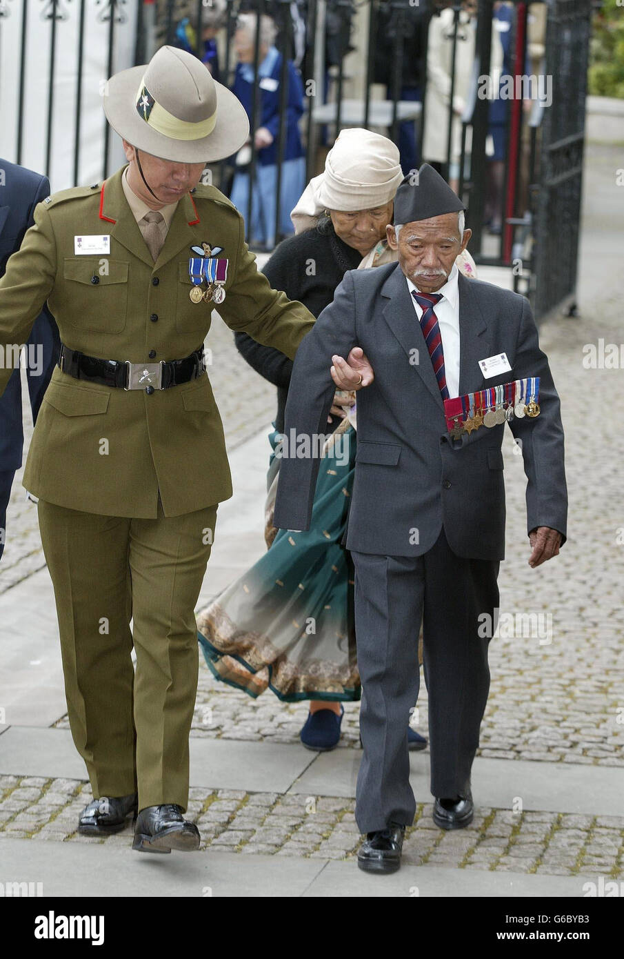 A Victoria Cross hero arrives at Westminster Abbey as heroes awarded the Victoria and George Crosses welcomed the commemoration of their valour with a national memorial unveiled by the Queen Elizabeth II. * The Queen who was accompanied by the Duke of Edinburgh, Wednesday May 14 2003, for The Dedication of The Victoria Cross and the George Cross Memorial.More than 1,600 descendants of past holders of the medals were present for a service of dedication addressed by Archbishop of Canterbury Dr Rowan Williams. Stock Photo