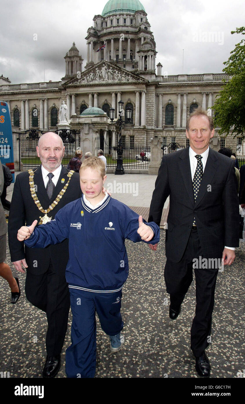 The United States Special Envoy to Northern Ireland, Ambassador Richard Haass (right), joins Belfast Mayor, Alex Maskey, and Special Olympic competitor, Sean Maguire, from Noth Belfast, on a walkabout in Belfast city centre, ahead of the 2003 Special Olmpics World Summer Games. Belfast will be acting as host city to more than 1,300 athletes and support staff from Team USA, who will be visiting Ireland for the 11th Special Olympics in exactly one month's time. Stock Photo
