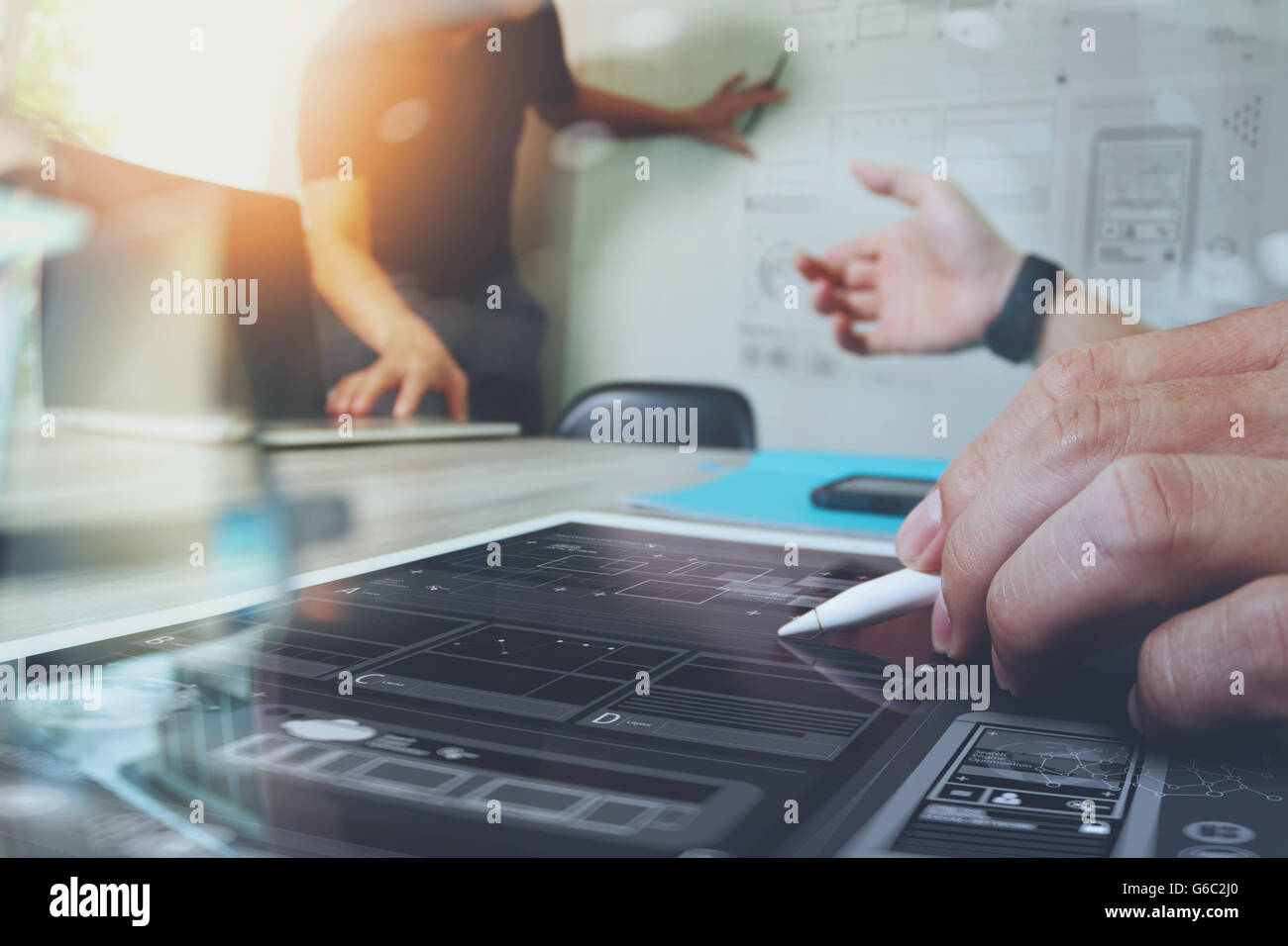 Businessman making presentation with his colleagues and business ...