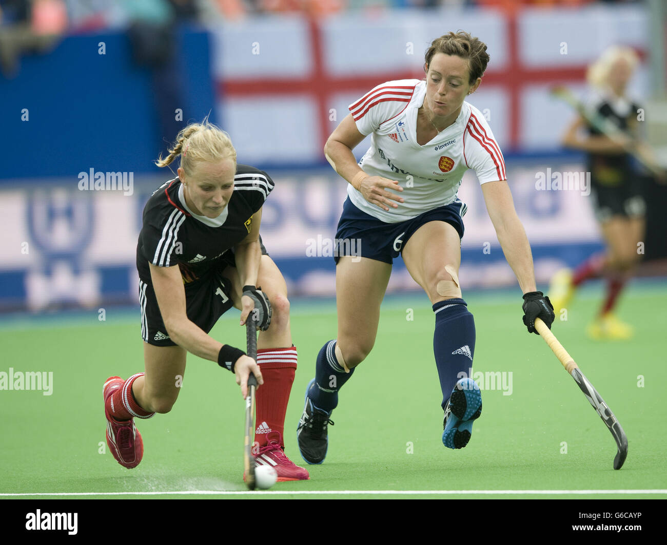 England's Hannah Macleod (right) challenges with Germany's Hannah Kruger during the Final of the TriFinance EuroHockey Championship at Braxgata HC, Boom, Belgium. Stock Photo