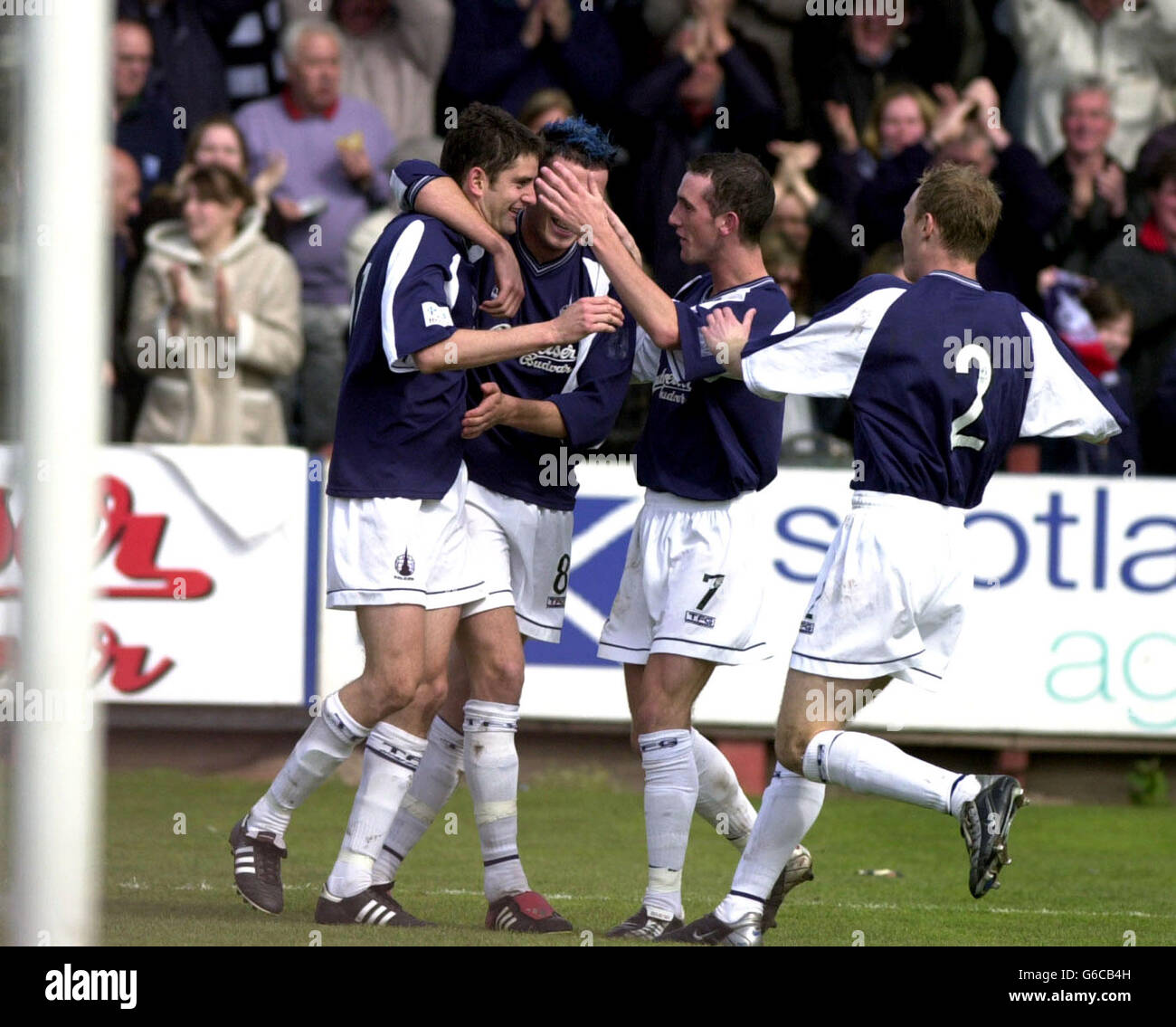 Falkirk's Stuart Taylor (far left) celebrating with teammates afetr