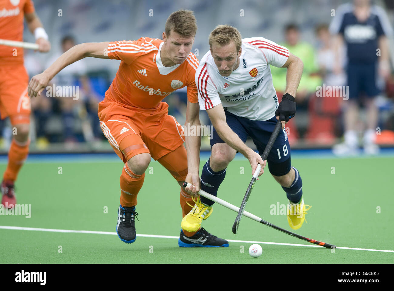 England's Barry Middleton (right) challenges with Netherland's Jelle Galema during the bronze medal match of the TriFinance EuroHockey Championship at Braxgata HC, Boom, Belgium. Stock Photo