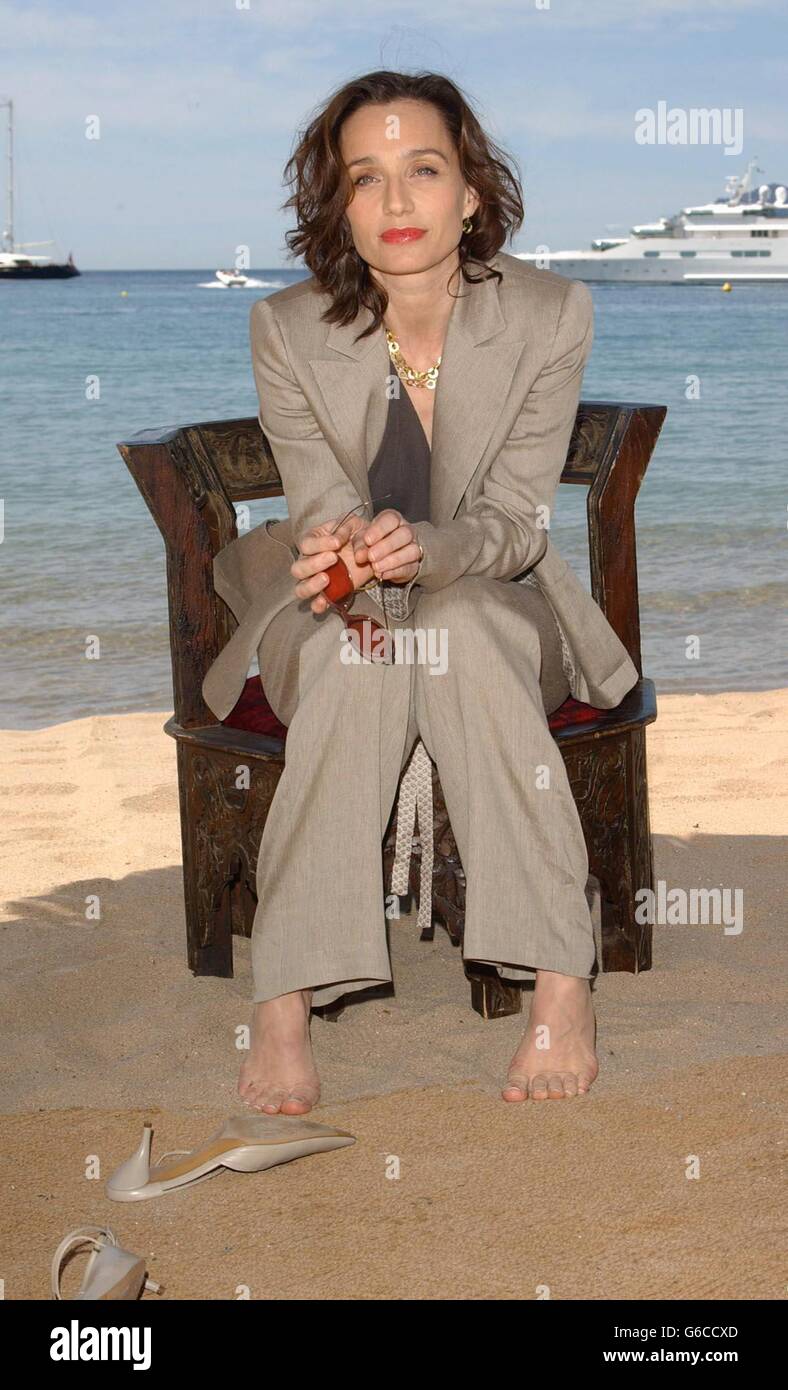 British actress Kristin Scott Thomas poses for photographers during a photocall on La Gallion beach in Cannes to promote her new film Arsene Lupin during the 56th Cannes Film Festival in France. 14/06/03 : British actress Kristin Scott Thomas who receives an OBE in the Queen's Birthday Honours for services to acting and to UK - French cultural relations. Stock Photo