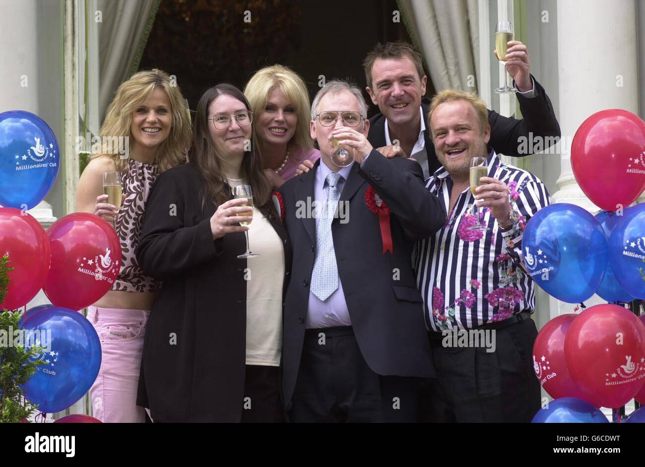 Television celebrities Anthony Worrall Thompson, Joanna Lumley, Phil Tufnell and Linda Barker join the 1,500th member of its millionaire club, Tim Davis, from Torquay, and his wife Eileen, in west London. * The event included more than 30 National Lottery millionaires to mark the 1,500th lottery millionaire last Wednesday when Mr Davis scooped the 3,168,574 Lotto jackpot. Stock Photo
