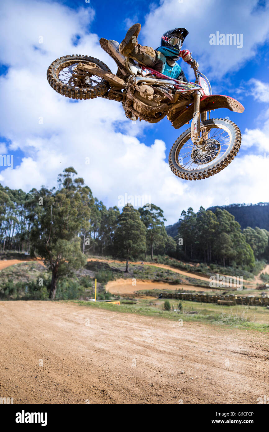 Motocross rider jumping a tabletop at Blackwood Park motocross track. Stock Photo