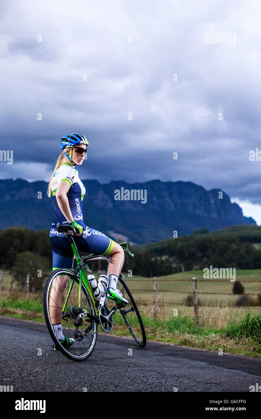 Tasmanian champion cyclist Macey Stewart out on a training ride on the country roads behind Sheffield near Mount Roland,North West Tasmania. Stock Photo