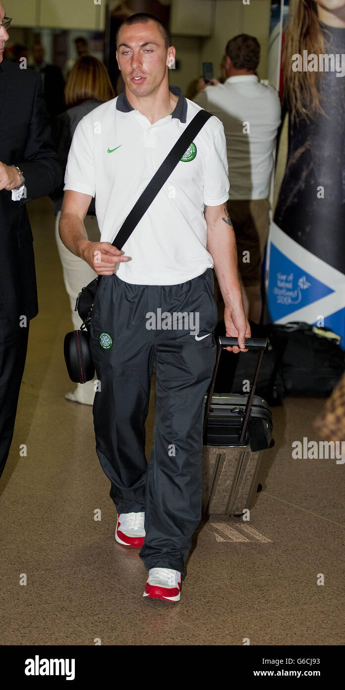 Soccer - Celtic Arrive back at Glasgow Airport Stock Photo