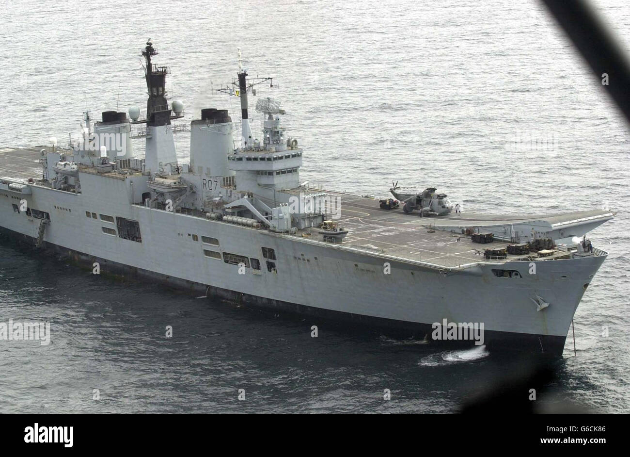 HMS Ark Royal in Mounts Bay, Cornwall. About 300 personnel from three helicopter squadrons flew off the warship to be reunited with loved-ones at RNAS Culdrose, their base at Helston, Cornwall. Among the returning crew were members of 849 A Flight, *..Airborne Surveillance and Control, which lost seven aircrew when two Sea King helicopters collided in mid-air in the Gulf. Personnel from 814 squadron and 820 squadron also left the carrier. The carrier is en-route back to Portsmouth Naval Base, where she is due to arrive. Stock Photo