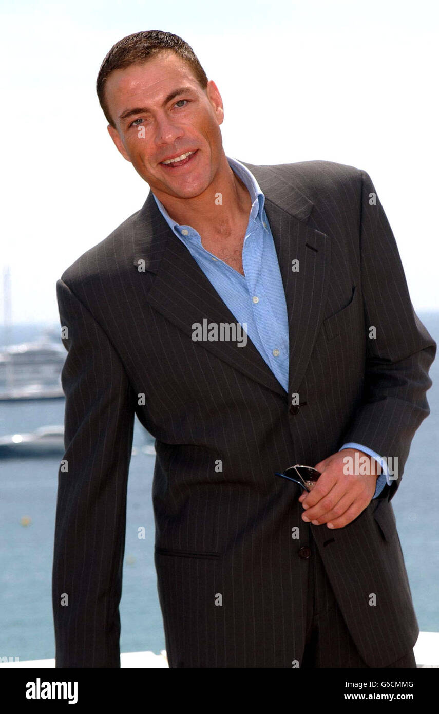 Actor Jean Claude Van Damme poses for photographers on the roof of the