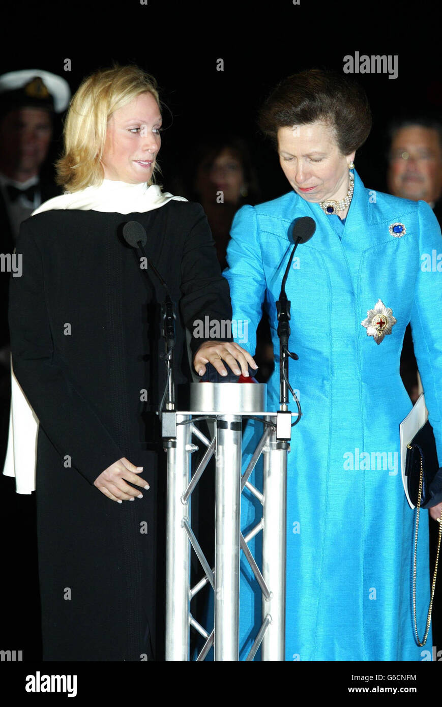 The Princess Royal and her daughter Zara Phillips together press a button  to release the two champagne bottles to name P&O's two newest ships Oceana  and Adonia at Southampton docks. Zara's bottle