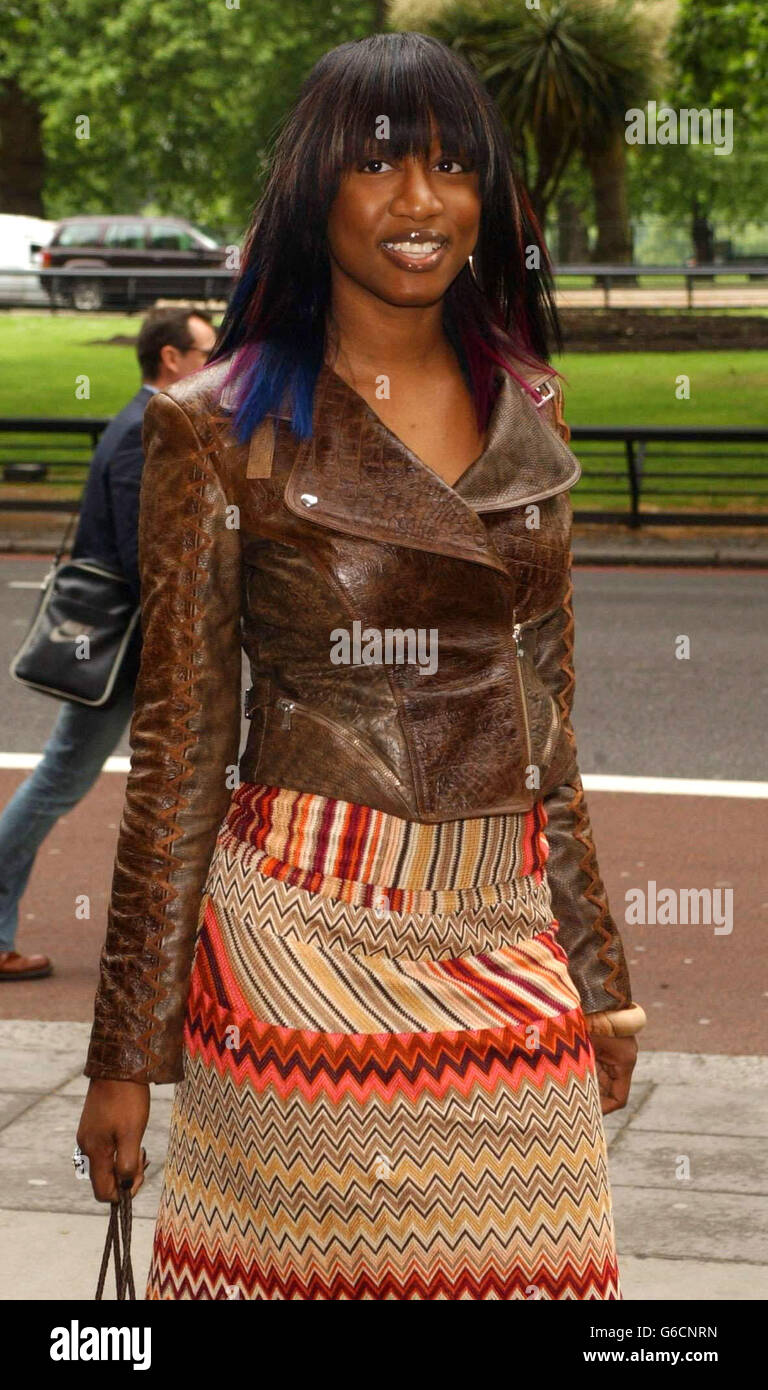 Celebrity smiling 3 4 three quarter length leather jacket beverley knight  hi-res stock photography and images - Alamy
